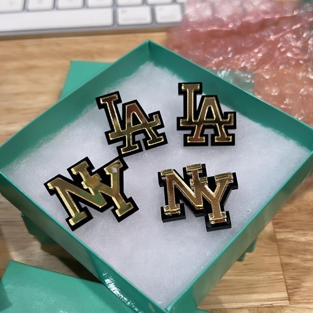 Melody Ehsani “NY” or “LA” earrings. NEW IN BOX. Both available sold separately.